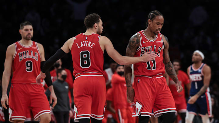 Dec 4, 2021; Brooklyn, New York, USA; Chicago Bulls guard Zach LaVine (8) boats Chicago Bulls forward DeMar DeRozan (11) on the chest after a three point basket against the Brooklyn Nets during the second half at Barclays Center. Mandatory Credit: Vincent Carchietta-Imagn Images Dec 4, 2021; Brooklyn, New York, USA; Chicago Bulls guard Zach LaVine (8) boats Chicago Bulls forward DeMar DeRozan (11) on the chest after a three point basket against the Brooklyn Nets during the second half at Barclays Center. Mandatory Credit: Vincent Carchietta-Imagn Images