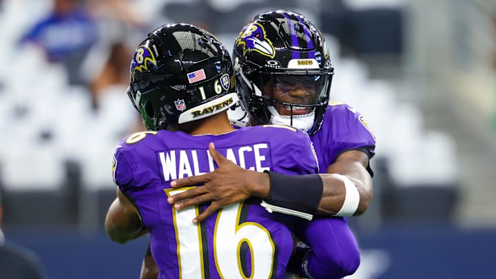 Sep 22, 2024; Arlington, Texas, USA;  Baltimore Ravens quarterback Lamar Jackson (8) hugs Baltimore Ravens wide receiver Tylan Wallace (16) before the game against the Dallas Cowboys at AT&T Stadium. Mandatory Credit: Kevin Jairaj-Imagn Images