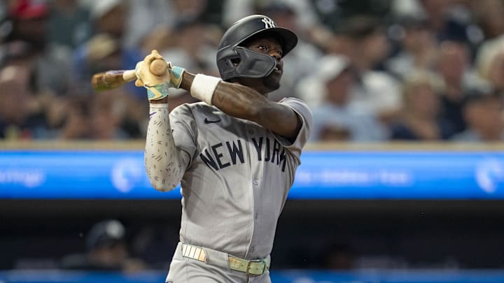 New York Yankees second baseman Jazz Chisholm Jr. (13) hits single against the Minnesota Twins in the sixth inning at Target Field. 