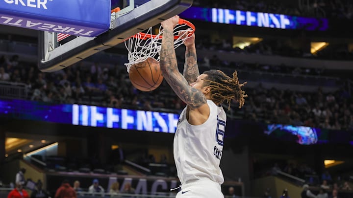 Feb 21, 2025; Orlando, Florida, USA; Memphis Grizzlies forward Brandon Clarke (15) dunks during the second half against the Orlando Magic at Kia Center. Mandatory Credit: Mike Watters-Imagn Images