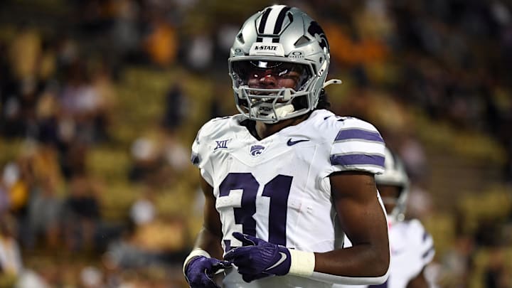 Oct 12, 2024; Boulder, Colorado, USA; Kansas State Wildcats running back DJ Giddens (31) warms up before the game against the Colorado Buffaloes at Folsom Field. Mandatory Credit: Christopher Hanewinckel-Imagn Images