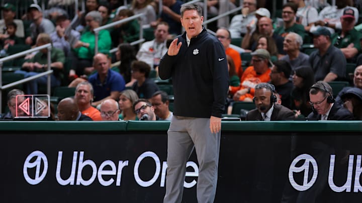Dec 7, 2024; Coral Gables, Florida, USA; Clemson Tigers head coach Brad Brownell watches from the sideline against the Miami Hurricanes during the first half at Watsco Center.