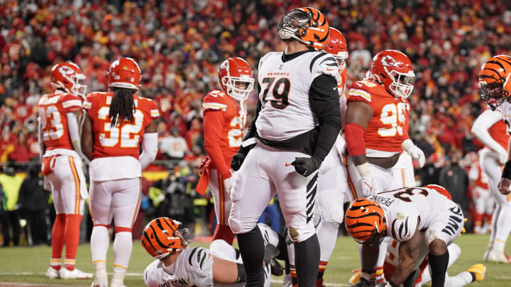 Jan 29, 2023; Kansas City, Missouri, USA; Cincinnati Bengals guard Jackson Carman (79) reacts after running back Samaje Perine (34) scored a touchdown against the Kansas City Chiefs during the third quarter of the AFC Championship game at GEHA Field at Arrowhead Stadium. Mandatory Credit: Denny Medley-USA TODAY Sports Jan 29, 2023; Kansas City, Missouri, USA; Cincinnati Bengals guard Jackson Carman (79) reacts after running back Samaje Perine (34) scored a touchdown against the Kansas City Chiefs during the third quarter of the AFC Championship game at GEHA Field at Arrowhead Stadium. Mandatory Credit: Denny Medley-USA TODAY Sports