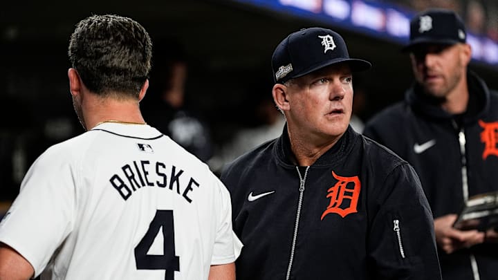 Detroit Tigers manager A.J. Hinch (14) shakes hands with pitcher Beau Brieske (4) in the dugout after top of seventh inning at Game 4 of ALDS at Comerica Park in Detroit on Thursday, Oct. 10, 2024.