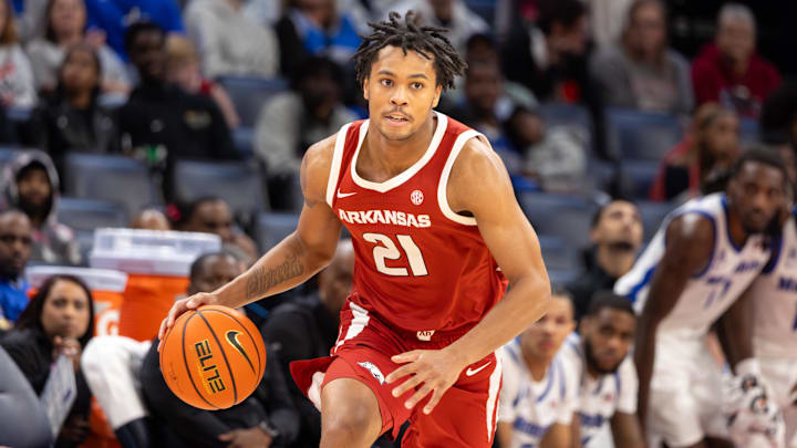 Oct 27, 2025; Memphis, TN, USA; Arkansas Razorbacks guard D.J. Wagner dribbles the ball up the court during the second half against the Memphis Tigers at FedEx Forum.