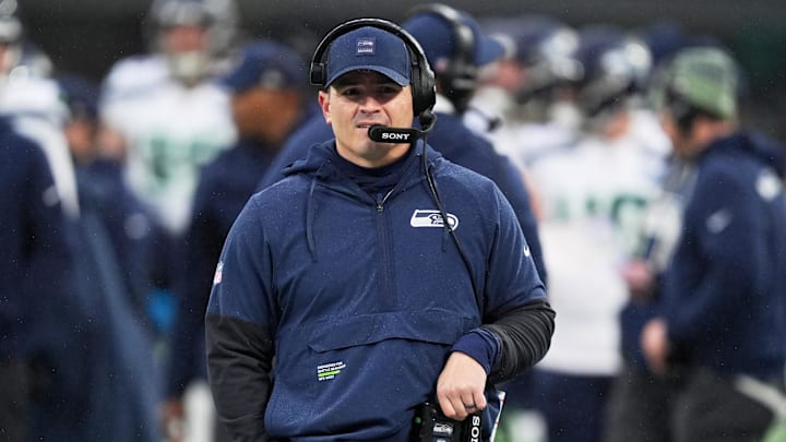 Dec 28, 2025; Charlotte, North Carolina, USA; Seattle Seahawks head coach Mike Macdonald looks on against the Carolina Panthers during the first quarter at Bank of America Stadium.