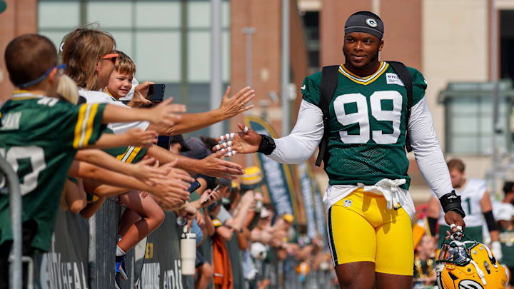 Green Bay Packers defensive lineman Barryn Sorrell (99) slaps hands with fans as he walks to practice practice on Friday, August 1, 2025, at Lambeau Field in Green Bay, Wis. 
Tork Mason/USA TODAY NETWORK-Wisconsin