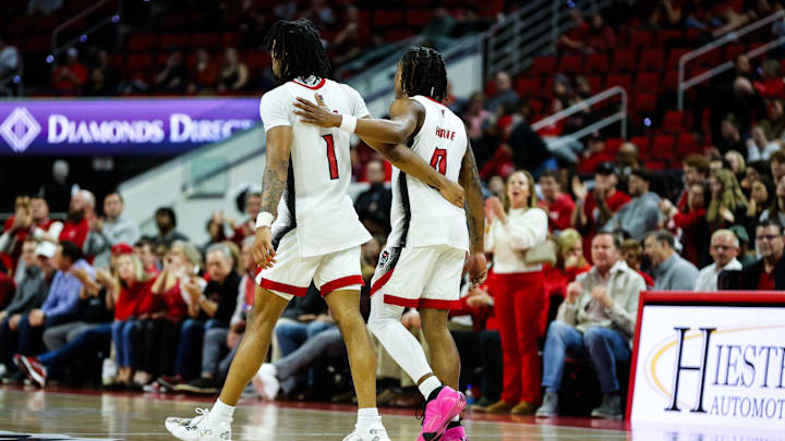 NC State basketball guards Jayden Taylor and DJ Horne