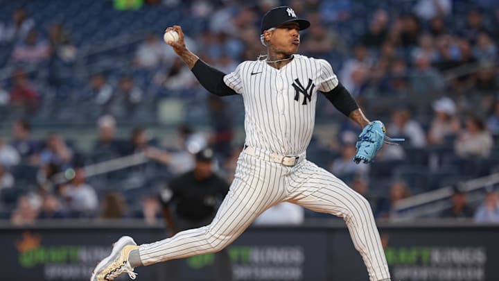 Sep 10, 2024; Bronx, New York, USA; New York Yankees starting pitcher Marcus Stroman (0) delivers a pitch during the first inning against the Kansas City Royals at Yankee Stadium. 