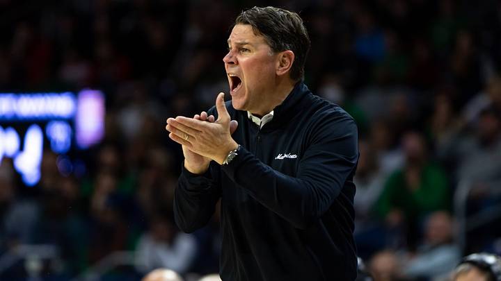 Purdue Fort Wayne Mastodons head coach Jon Coffman claps and shouts. Purdue Fort Wayne Mastodons head coach Jon Coffman claps and shouts.