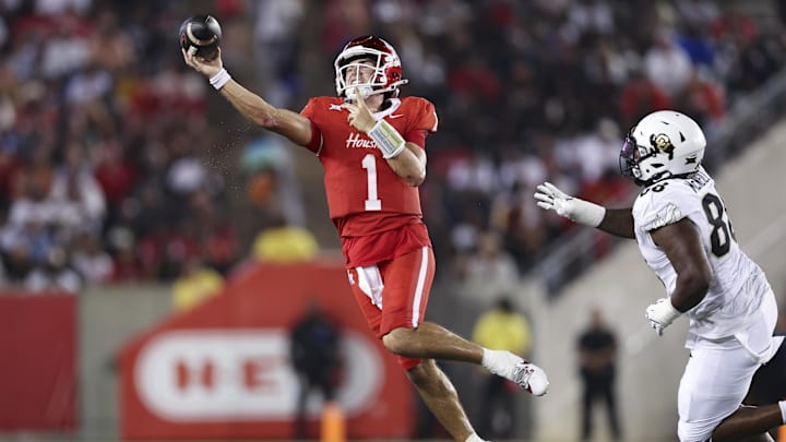 Sep 12, 2025; Houston, Texas, USA; Houston Cougars quarterback Conner Weigman (1) throws the ball during the second half against the Colorado Buffaloes at TDECU Stadium. Mandatory Credit: Troy Taormina-Imagn Images