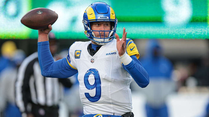 Dec 22, 2024; East Rutherford, New Jersey, USA; Los Angeles Rams quarterback Matthew Stafford (9) throws the ball during the second half against the New York Jets at MetLife Stadium. Mandatory Credit: Vincent Carchietta-Imagn Images