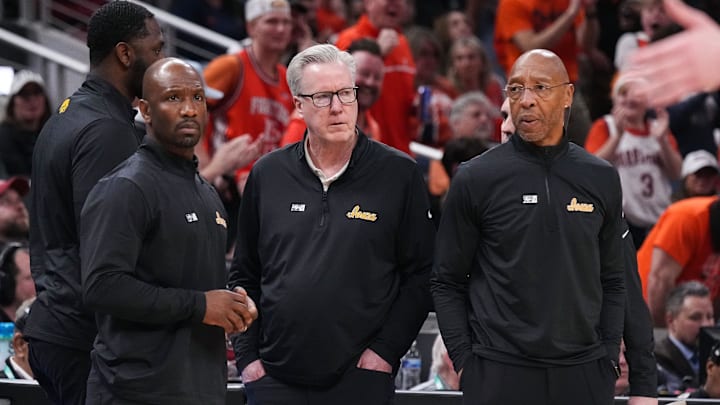 Iowa Hawkeyes head coach Fran McCaffery (middle) is ejected from the game Thursday, March 13, 2025, during the second round of the men's Big Ten tournament at Gainbridge Fieldhouse in Indianapolis. The Illinois Fighting Illini defeated the Iowa Hawkeyes, 106-94.