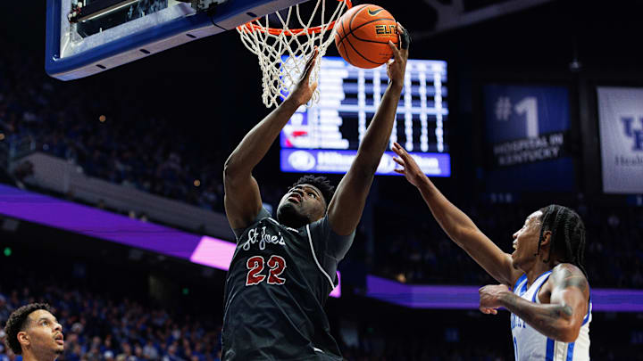 Nov 20, 2023; Lexington, Kentucky, USA; Saint Joseph's Hawks center Christ Essandoko (22) drives to Nov 20, 2023; Lexington, Kentucky, USA; Saint Joseph's Hawks center Christ Essandoko (22) drives to