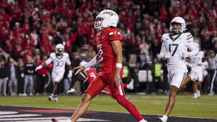 Oct 25, 2025; Cincinnati, Ohio, USA;  Cincinnati Bearcats quarterback Brendan Sorsby (2) runs with the ball for a touchdown against the Baylor Bears in the second half at Nippert Stadium. Mandatory Credit: Aaron Doster-Imagn Images