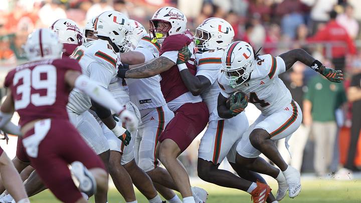 Sep 4, 2026; Stanford, California, USA;  Miami Hurricanes running back Mark Fletcher Jr. (4) carries the ball against the Stanford Cardinal during the first quarter at Stanford Stadium.  Mandatory Credit: Stan Szeto-Imagn Images