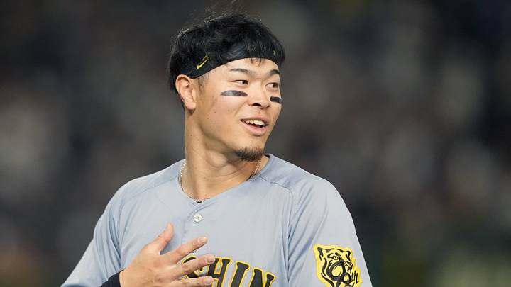 Mar 15, 2025; Bunkyo, Tokyo, Japan; Hanshin Tigers right fielder Teruaki Sato (8) during the fifth inning against the Chicago Cubs at Tokyo Dome. Mandatory Credit: Darren Yamashita-Imagn Images Mar 15, 2025; Bunkyo, Tokyo, Japan; Hanshin Tigers right fielder Teruaki Sato (8) during the fifth inning against the Chicago Cubs at Tokyo Dome. Mandatory Credit: Darren Yamashita-Imagn Images