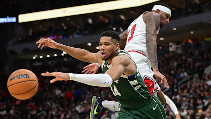 Nov 20, 2024; Milwaukee, Wisconsin, USA; Milwaukee Bucks forward Giannis Antetokounmpo (34) reaches for a loose ball against Chicago Bulls forward Torrey Craig (13) in the fourth quarter at Fiserv Forum. Mandatory Credit: Benny Sieu-Imagn Images Nov 20, 2024; Milwaukee, Wisconsin, USA; Milwaukee Bucks forward Giannis Antetokounmpo (34) reaches for a loose ball against Chicago Bulls forward Torrey Craig (13) in the fourth quarter at Fiserv Forum. Mandatory Credit: Benny Sieu-Imagn Images