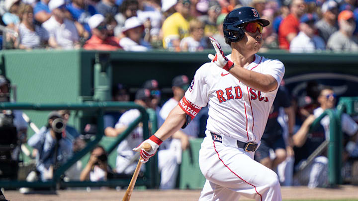 Mar 2, 2025; Fort Myers, Florida, USA; Boston Red Sox Masataka Yoshida (7) hits a ground-rule double on a line drive to right field in the first inning of their game with the New York Mets at JetBlue Park at Fenway South. Mandatory Credit: Chris Tilley-Imagn Images Mar 2, 2025; Fort Myers, Florida, USA; Boston Red Sox Masataka Yoshida (7) hits a ground-rule double on a line drive to right field in the first inning of their game with the New York Mets at JetBlue Park at Fenway South. Mandatory Credit: Chris Tilley-Imagn Images