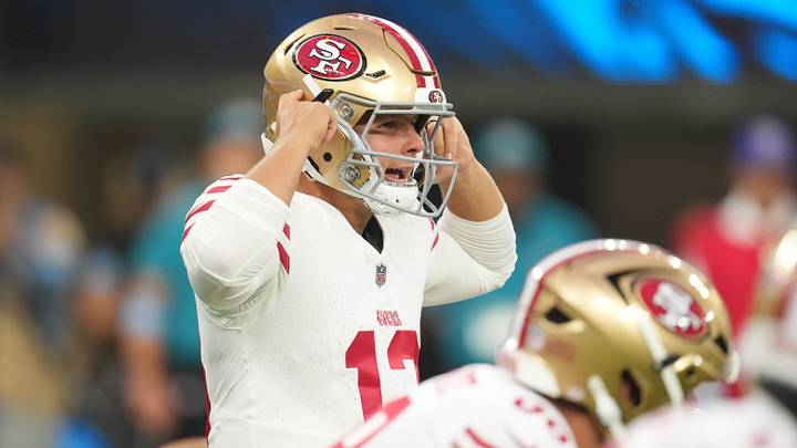 49ers quarterback Brock Purdy (13) prepares to take the snap.