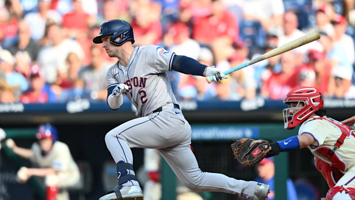 Aug 28, 2024; Philadelphia, Pennsylvania, USA; Houston Astros infielder Alex Bregman (2) hits a single against the Philadelphia Phillies in the third inning at Citizens Bank Park.
