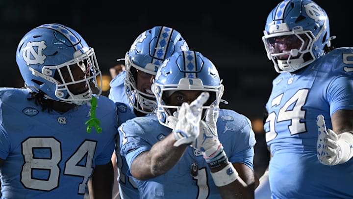 Nov 22, 2025; Chapel Hill, North Carolina, USA; North Carolina Tar Heels wide receiver Jordan Shipp (1) celebrates after a touchdown during the second half at Kenan Stadium. Mandatory Credit: William Howard-Imagn Images