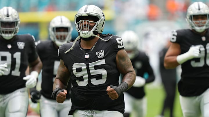 Las Vegas Raiders defensive tackle John Jenkins warms-up before the game against the Miami Dolphins.
