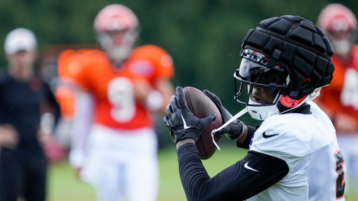 Cincinnati Bengals wide receiver Tee Higgins (5) catches a pass during a preseason training camp practice at the Paycor Stadium practice field in downtown Cincinnati on Wednesday, Aug. 7, 2024.
