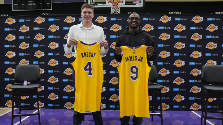 Jul 2, 2024; El Segundo, CA, USA; From left: Los Angeles Lakers first round draft pick Dalton Knecht (4) and second round draft pick Bronny James (9) pose at a press conference at the UCLA Health Training Center. Mandatory Credit: Kirby Lee-USA TODAY Sports