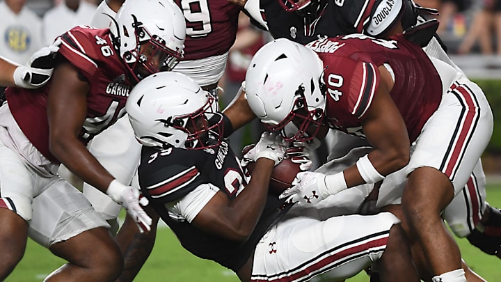 South Carolina football linebacker Ronnie Porter making a tackle during the Garnet and Black Spring Game