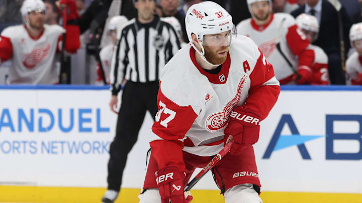 Apr 11, 2025; Tampa, Florida, USA;Detroit Red Wings left wing J.T. Compher (37) plays the puck during overtime against the Tampa Bay Lighting at Amalie Arena. Mandatory Credit: Kim Klement Neitzel-Imagn Images