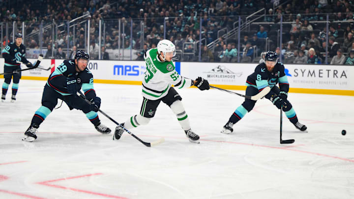 Mar 31, 2025; Seattle, Washington, USA; Dallas Stars center Wyatt Johnston (53) scores a goal against the Seattle Kraken during the first period at Climate Pledge Arena. Mandatory Credit: Steven Bisig-Imagn Images