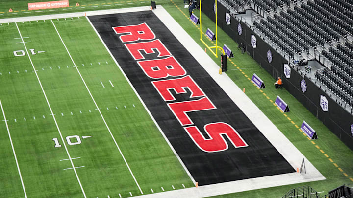 The UNLV Rebels logo in the end zone is seen before the Mountain West Championship between the Boise State Broncos and the UNLV Rebels at Allegiant Stadium. Mandatory Credit: Kirby Lee-Imagn Images The UNLV Rebels logo in the end zone is seen before the Mountain West Championship between the Boise State Broncos and the UNLV Rebels at Allegiant Stadium. Mandatory Credit: Kirby Lee-Imagn Images
