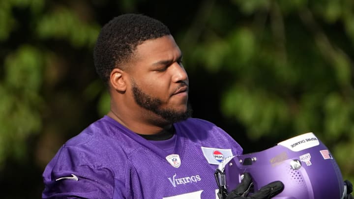 Oct 4, 2024; Watford, United Kingdom; Minnesota Vikings offensive tackle Christian Darrisaw (71) during practice at The Grove. 