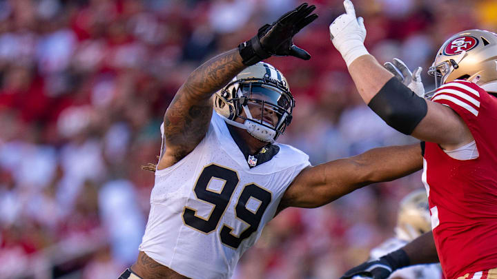 August 18, 2024; Santa Clara, California, USA; New Orleans Saints defensive end Chase Young (99) rushes against San Francisco 49ers guard Jarrett Kingston (62) during the second quarter at Levi's Stadium. Mandatory Credit: Kyle Terada-Imagn Images