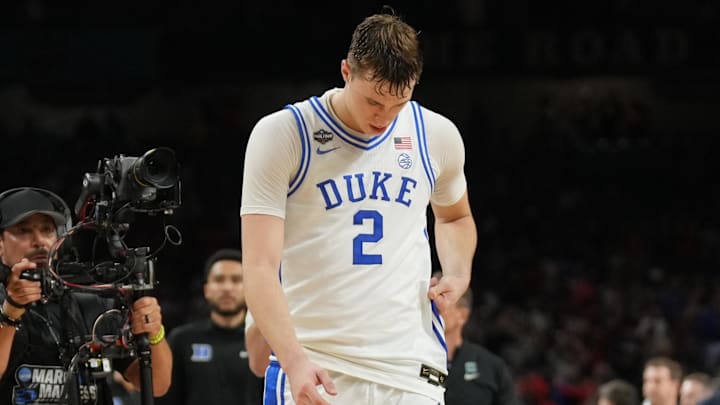 Apr 5, 2025; San Antonio, TX, USA; Duke Blue Devils forward Cooper Flagg (2) reacts after losing to the Houston Cougars in the semifinals of the men's Final Four of the 2025 NCAA Tournament at the Alamodome. Mandatory Credit: Robert Deutsch-Imagn Images Apr 5, 2025; San Antonio, TX, USA; Duke Blue Devils forward Cooper Flagg (2) reacts after losing to the Houston Cougars in the semifinals of the men's Final Four of the 2025 NCAA Tournament at the Alamodome. Mandatory Credit: Robert Deutsch-Imagn Images
