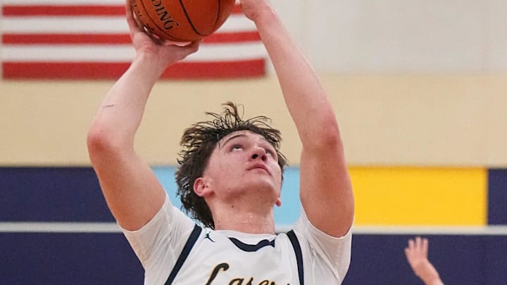 Kettle Moraine's Roman Thompson (23) elevates for a shot during a home game against Classic 8 rival Arrowhead on Tuesday, Dec. 3, 2024.