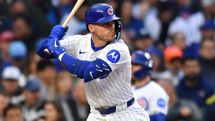 Chicago Cubs second baseman Nico Hoerner (2) hits against the Colorado Rockies at Wrigley Field. 