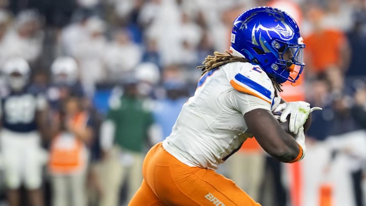 Dec 31, 2024; Glendale, AZ, USA; Boise State Broncos running back Ashton Jeanty (2) against the Penn State Nittany Lions during the Fiesta Bowl at State Farm Stadium. Dec 31, 2024; Glendale, AZ, USA; Boise State Broncos running back Ashton Jeanty (2) against the Penn State Nittany Lions during the Fiesta Bowl at State Farm Stadium.