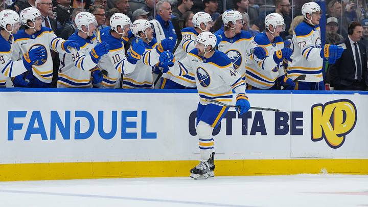 Dennis Gilbert celebrates with his Buffalo Sabres teammates during a win over the Toronto Maple Leafs Dennis Gilbert celebrates with his Buffalo Sabres teammates during a win over the Toronto Maple Leafs