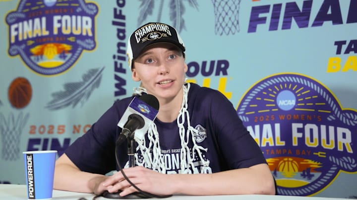 Apr 6, 2025; Tampa, FL, USA; Connecticut Huskies guard Paige Bueckers (5) speaks to the media after the national championship of the women's 2025 NCAA tournament against the South Carolina Gamecocks at Amalie Arena. Mandatory Credit: Kirby Lee-Imagn Images