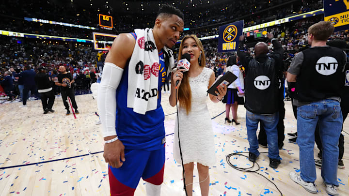 May 3, 2025; Denver, Colorado, USA; Denver Nuggets guard Russell Westbrook (4) is interviewed by ESPN reporter Betty Zhou following the win against the LA Clippers in the game seven of first round for the 2025 NBA Playoffs at Ball Arena. Mandatory Credit: Ron Chenoy-Imagn Images