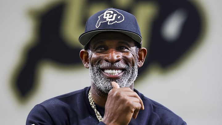 Apr 4, 2025; Boulder, CO, USA; Colorado Buffaloes head coach Deion Sanders watches as his players go through drills at the University of Colorado NFL Showcase at the CU Indoor Practice Facility. Mandatory Credit: Michael Ciaglo-Imagn Images