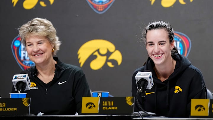 Apr 4, 2024; Cleveland, OH, USA; Iowa Hawkeyes coach Lisa Bluder (left) and guard Caitlin Clark during press conference at Rocket Mortgage FieldHouse. Mandatory Credit: Kirby Lee-Imagn Images