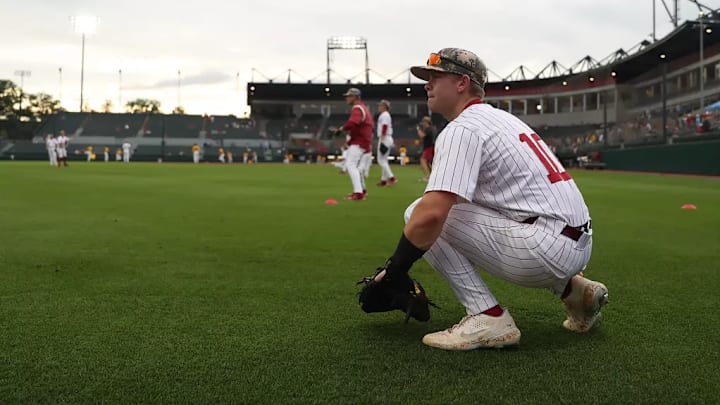 Alabama catcher Brady Neal (10).