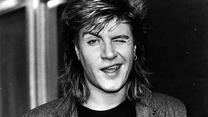 Simon Le Bon of Duran Duran rocks a mull—er, bi-level haircut.