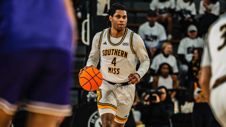 Southern Miss forward Tylik Weeks takes the ball down the floor. Southern Miss forward Tylik Weeks takes the ball down the floor.