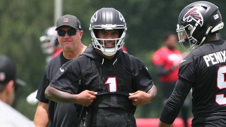 Tua Tagovailoa and Michael Penix Jr. working together at Atlanta Falcons OTAs.