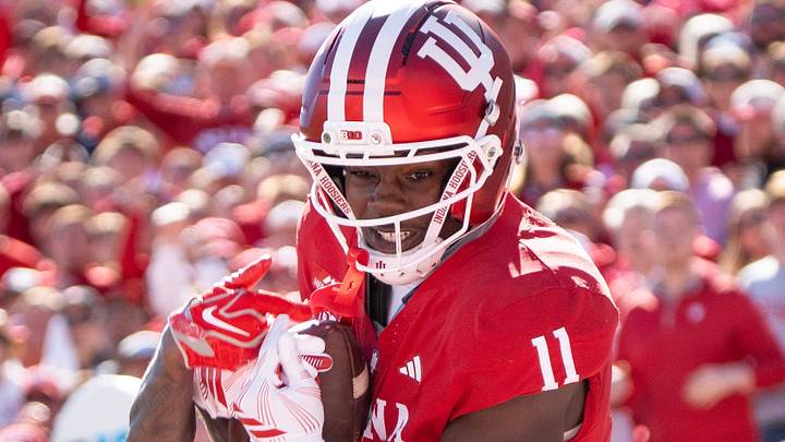 Indiana's Nick Marsh (11) catches a touchdown pass as he is defended by Ohio State's Cam Calhoun (18) during the Indiana versus Ohio State football game at Memorial Stadium on Saturday, Oct. 17, 2026.