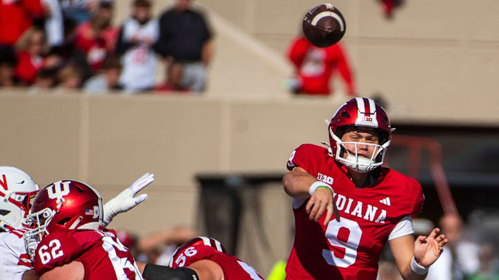 Indiana's Kurtis Rourke (9) passes against Nebraska on Saturday before he got hurt. 